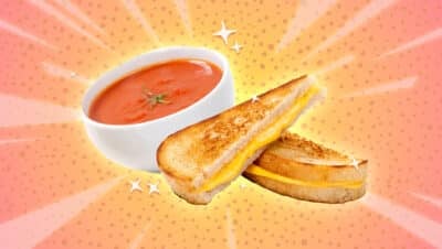 Soup and Grilled Cheese in front of pink lemonade exciting background